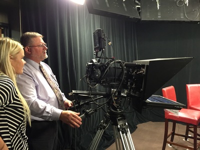 Lowell Haag demonstrates studio camera operation at On Call with the Prairie Doc at yeager Media Center on the campus of SDSU in Brookings, SD.